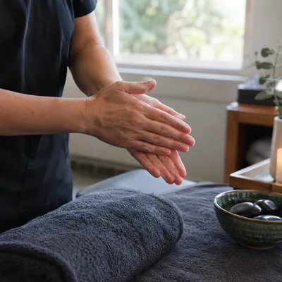 Warm oil and hot stones